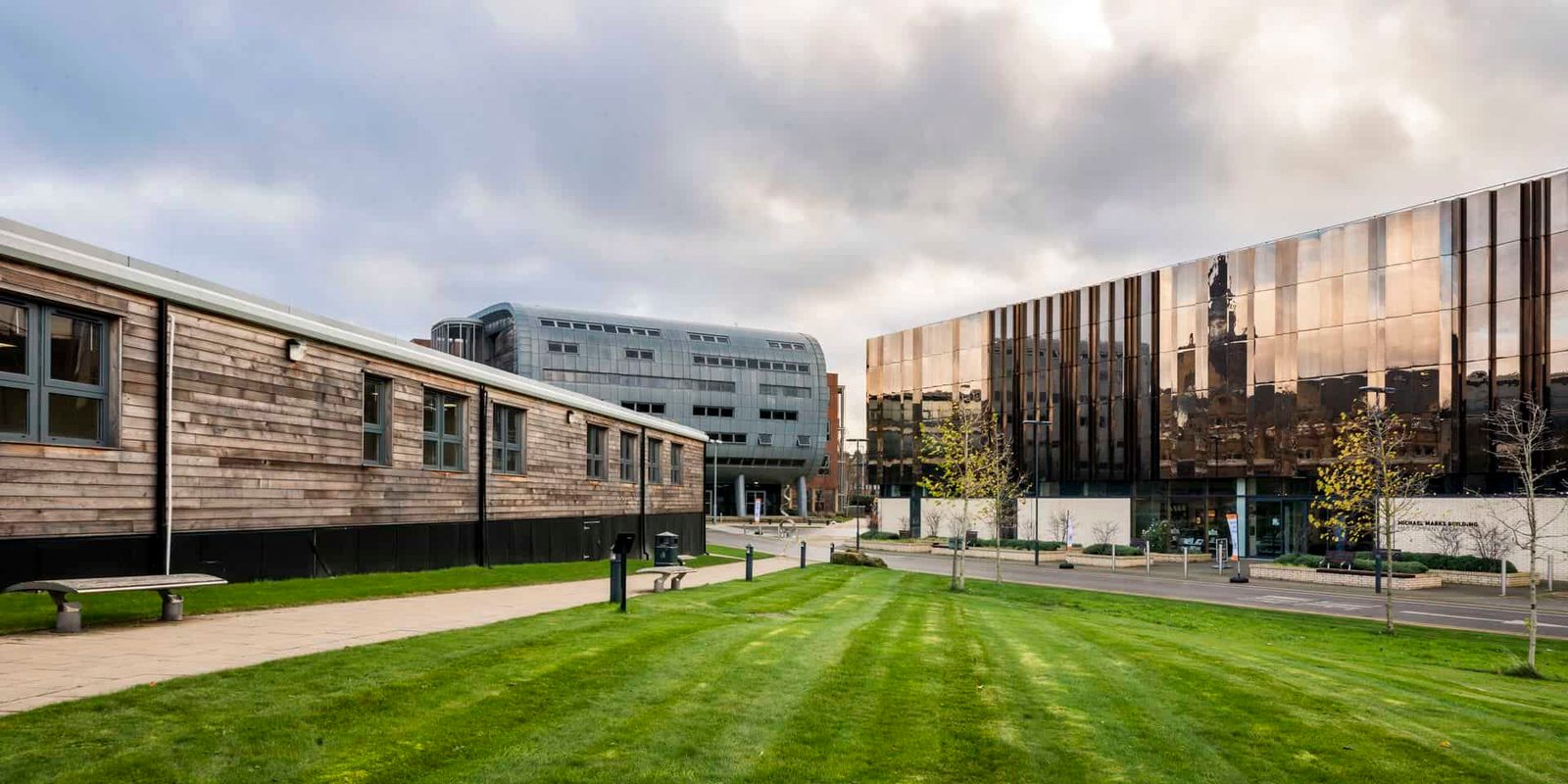 A building with a grassy area in front of it.