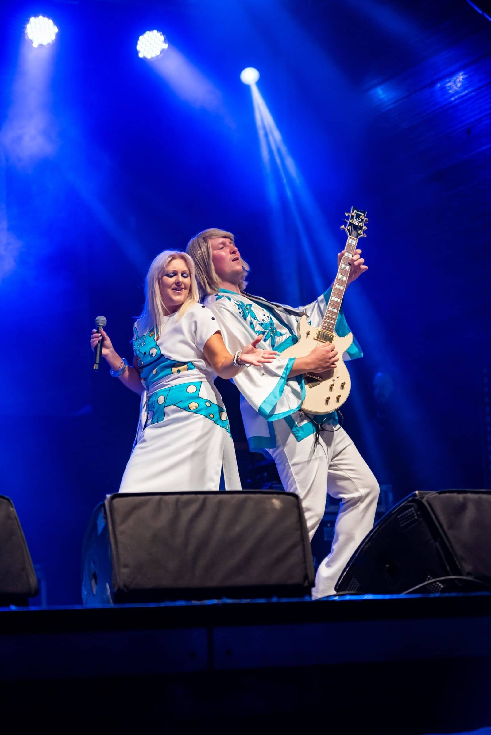 A man and a woman on stage.