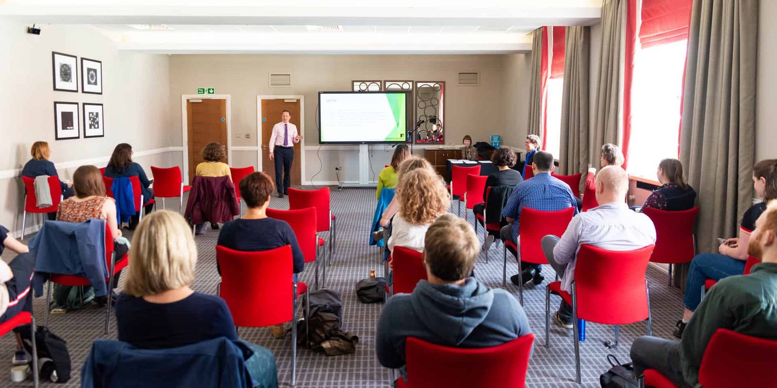 A group of people in a room.