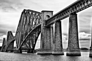 A black and white photo of the forth bridge.