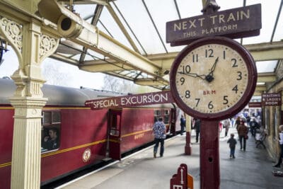 A train station with a clock.