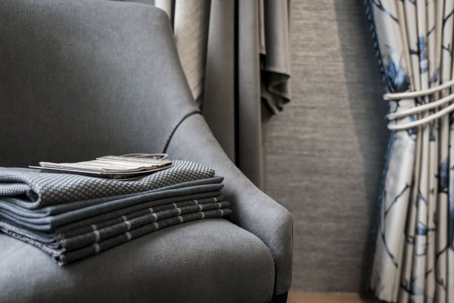 Styled grey chair photographed for a commercial interiors client