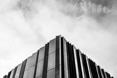 A black and white photo of an office building.
