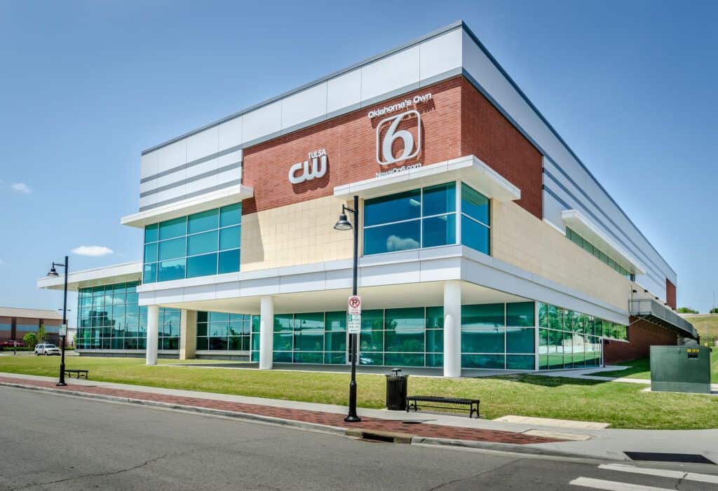 A large building with a sign on it.