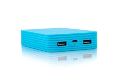 A blue power bank with two usb ports.