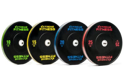 A set of weight plates with different colors and designs.